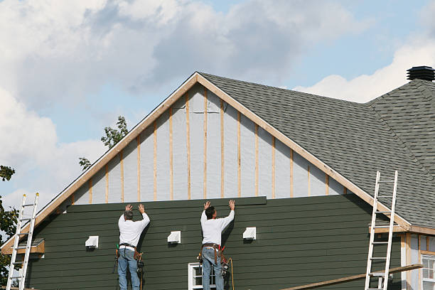 Professional Siding Replacement technician working in Hendersonville, NC